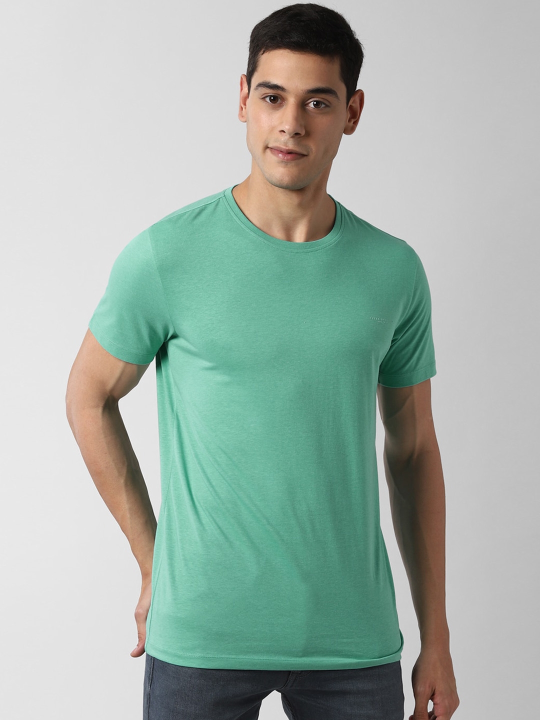 Buy Peter England Casuals Men Green Slim Fit Solid Round Neck T Shirt ...