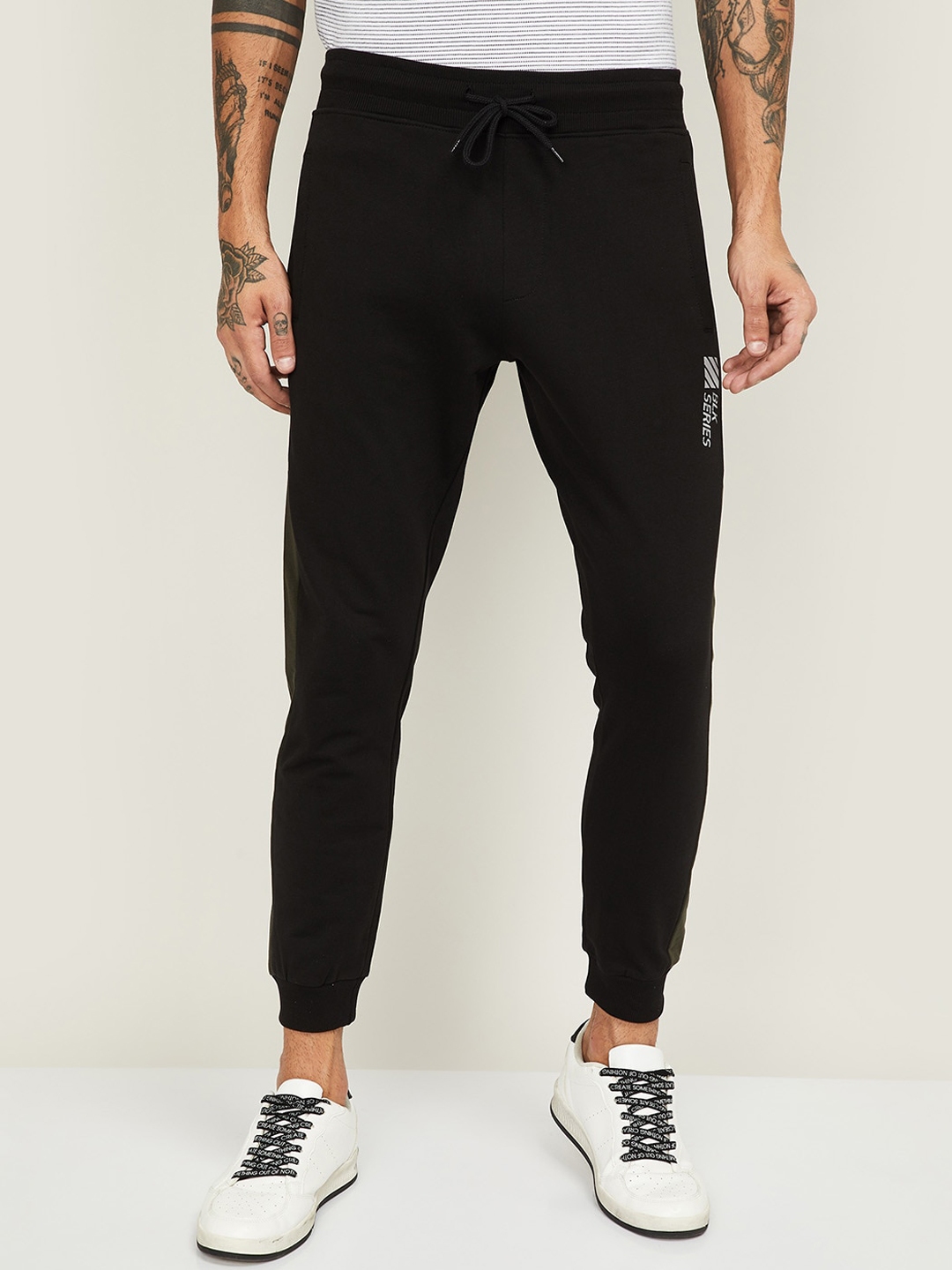 Buy Bossini Men Black Solid Slim Fit Joggers - Track Pants for Men ...