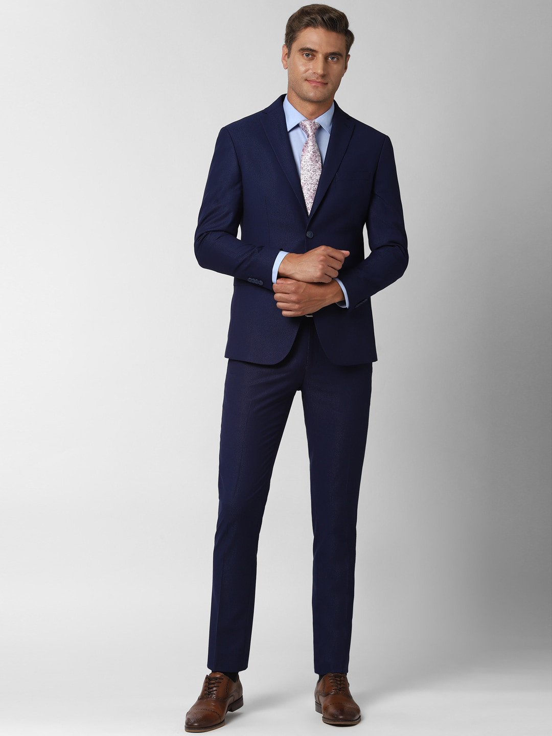 Buy Peter England Elite Men Navy Blue Solid Slim Fit Single Breasted ...