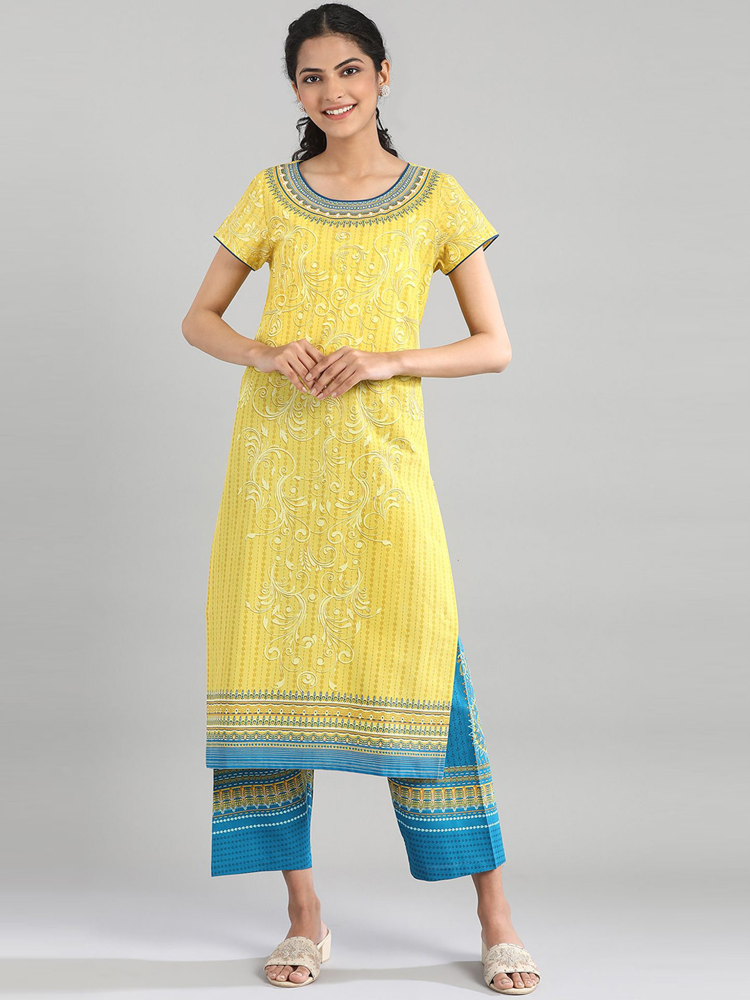 Women Off-White & Yellow Printed Kurta With Trousers main image 0