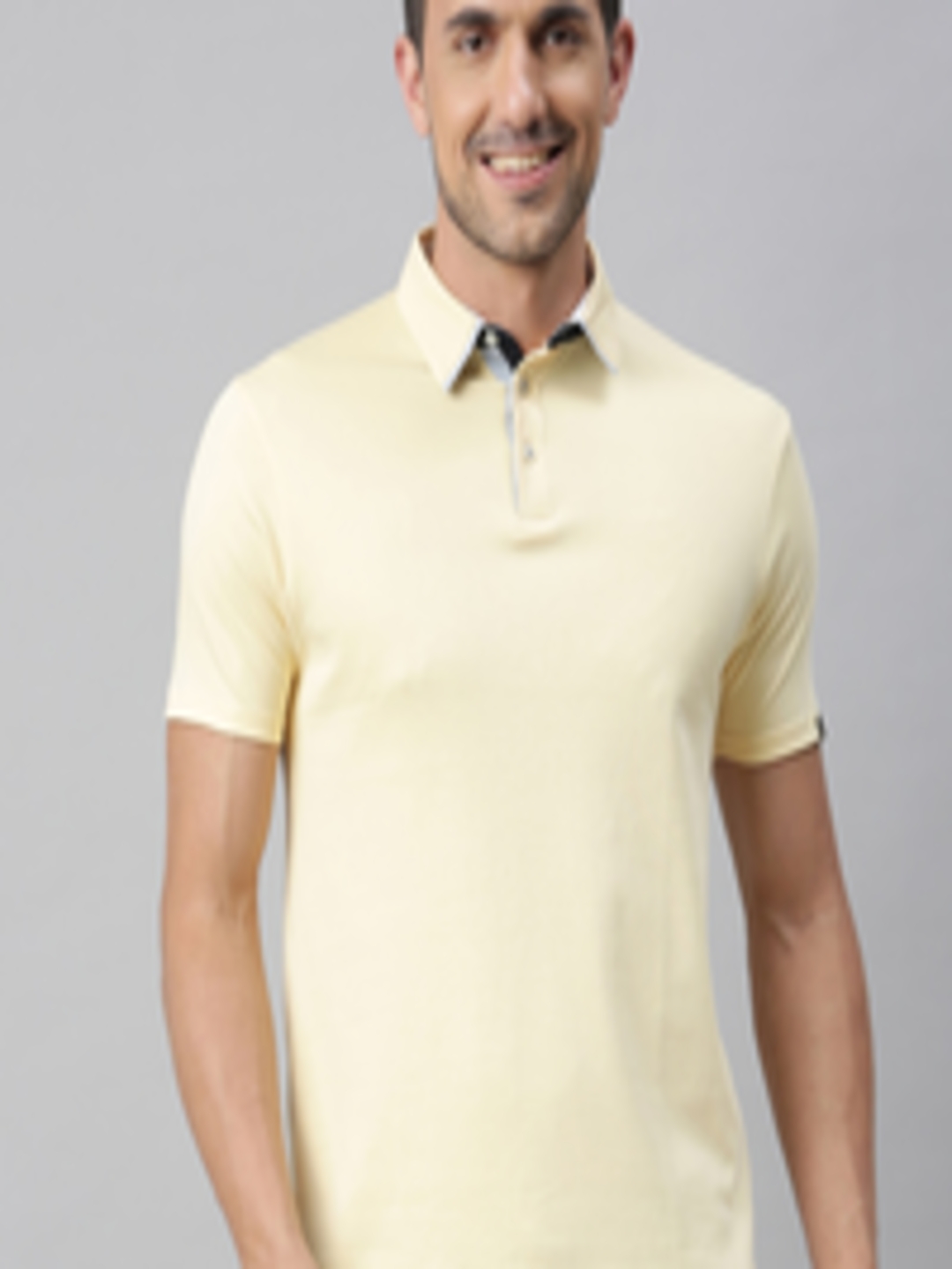 Buy RARE RABBIT Men Yellow Solid Polo Collar T Shirt - Tshirts for Men ...