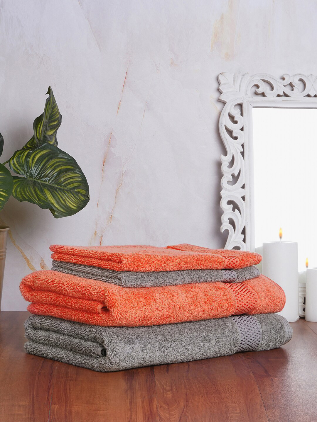 Buy SPACES Unisex Pack Of 4 Grey & Orange Solid 600 GSM Cotton Bath