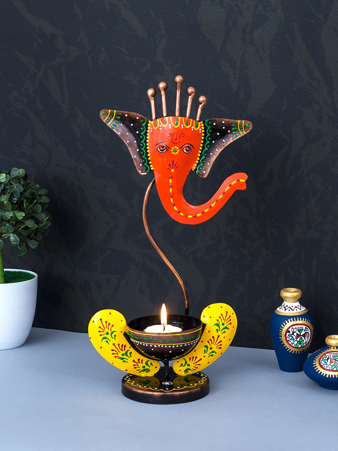 Buy Golden Peacock Orange & Yellow Handcrafted & Handpainted Ganesha Tea Light Candle Holder