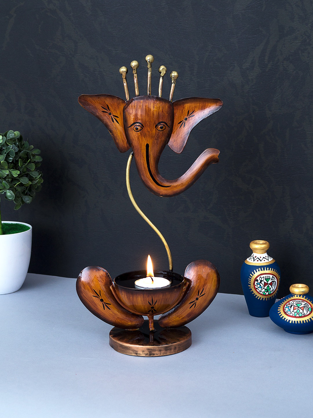 Buy Golden Peacock Brown Handcrafted & Handpainted Ganesha Tea Light Candle Holder Showpieces