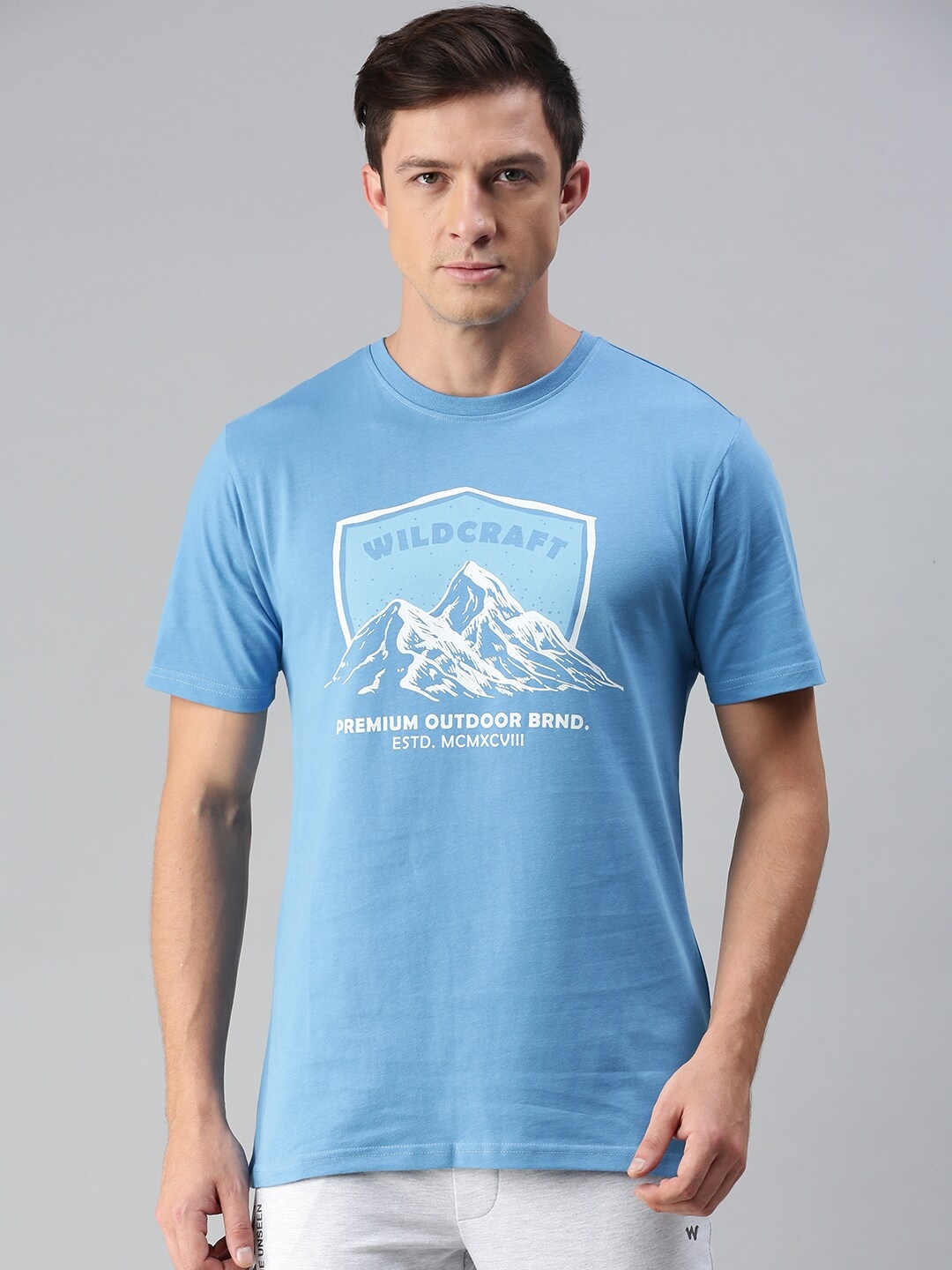 Buy Wildcraft Men Blue & White Typography Printed Applique T Shirt ...