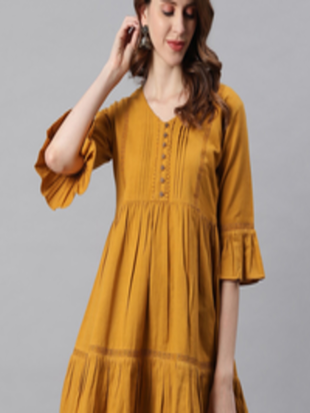 Buy Janasya Women Mustard Textured Bell Sleeves Tunic - Tunics for ...