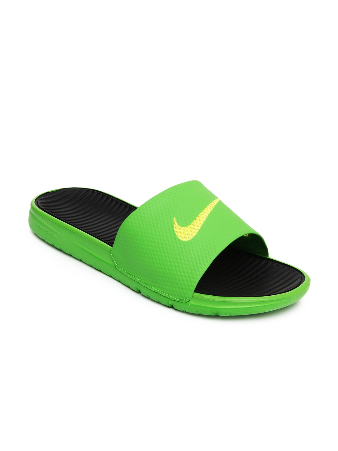 mint green nike flip flops