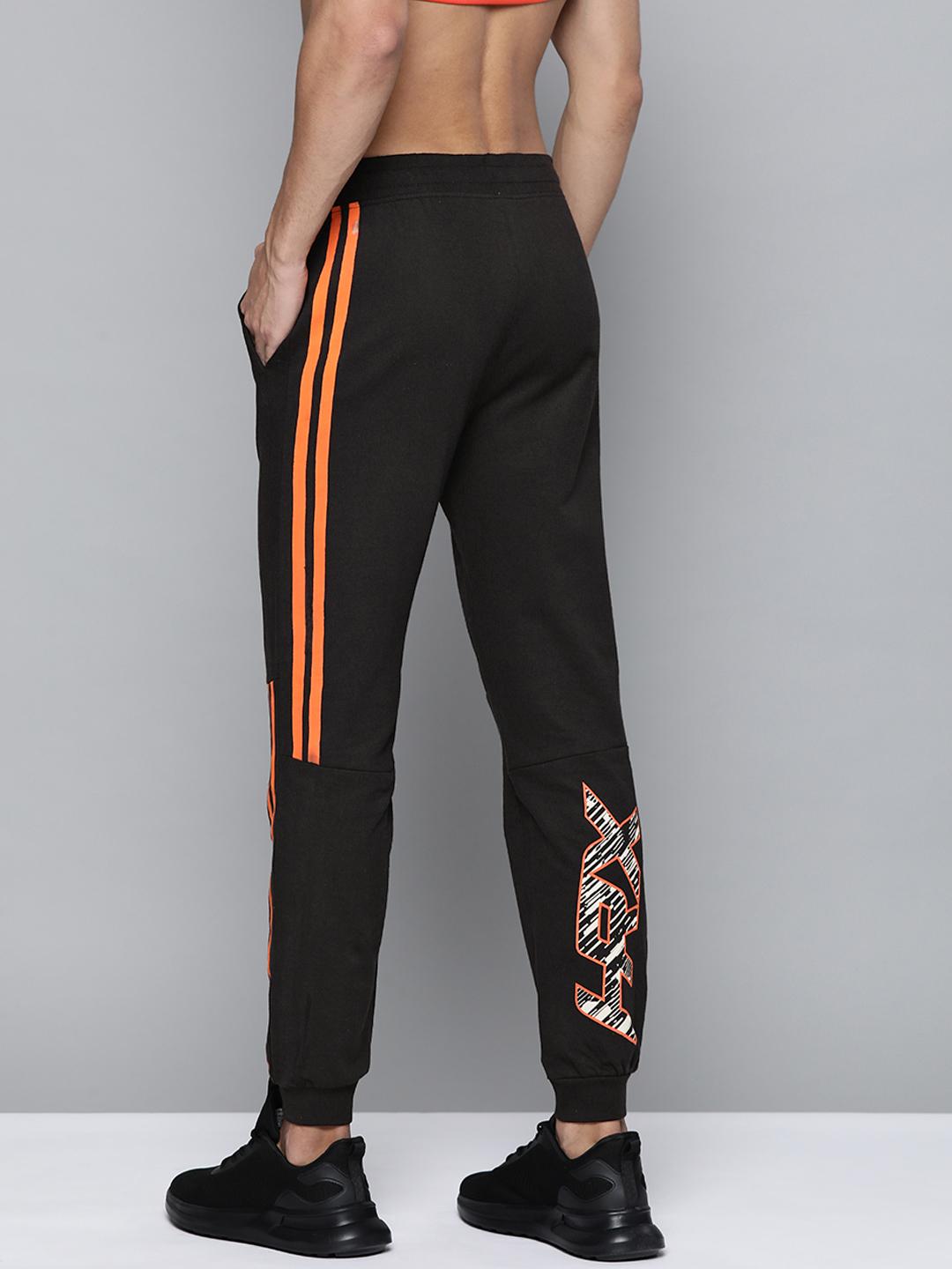 Buy HRX By Hrithik Roshan Men Black Solid Cotton Rapid Dry Training ...