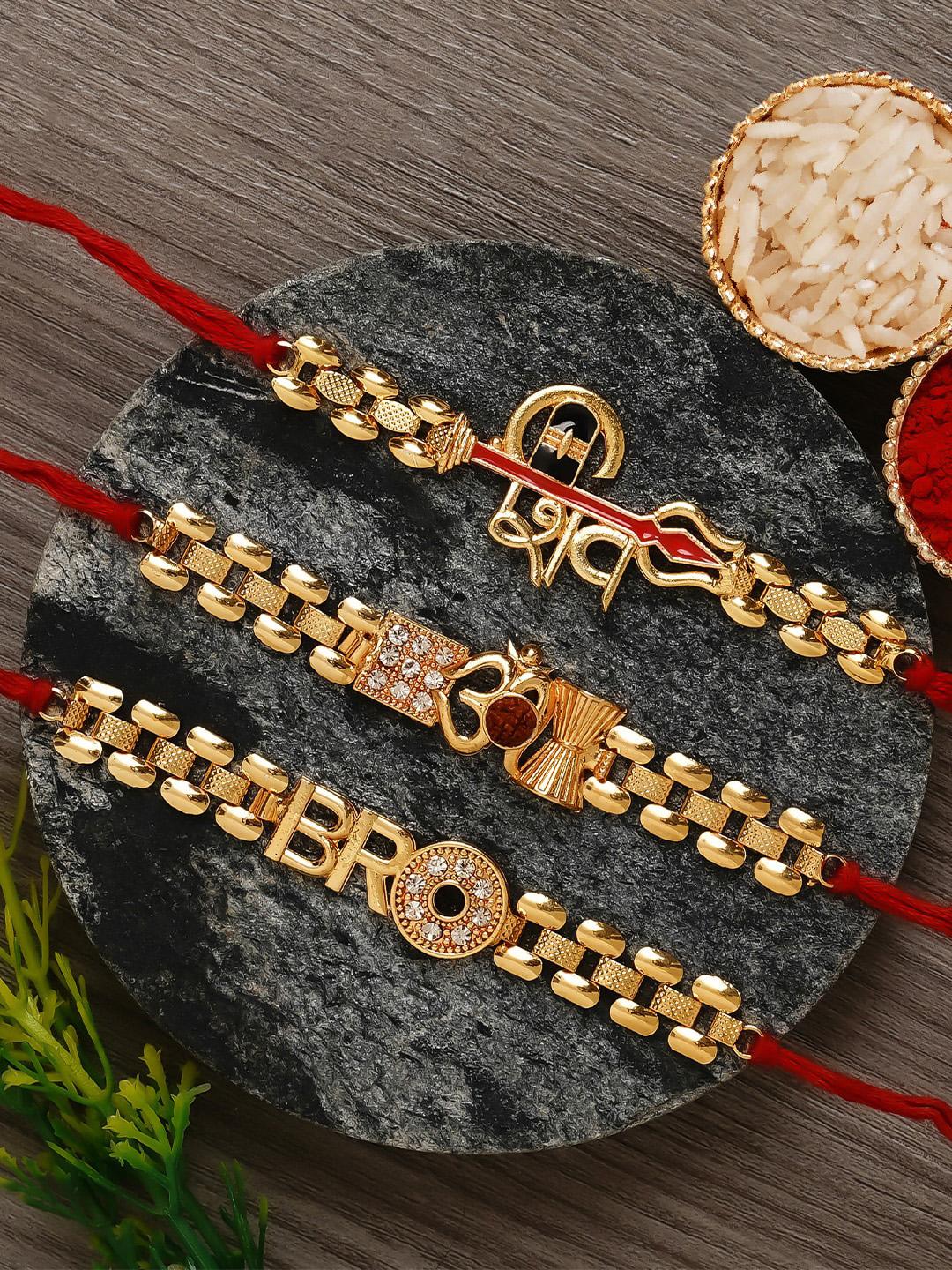 Gold Rakhi Models Buy ECraftIndia Gold Toned & Red Set Of 3 Designer Rakhi With Roli ...