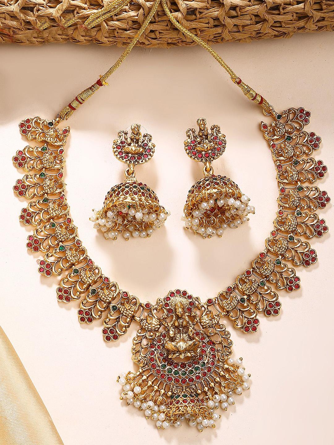Buy KARATCART Gold Plated Studded & Pearls Beaded Laxmi Mata And Peacock Temple Jewellery Set -  - Accessories for Women