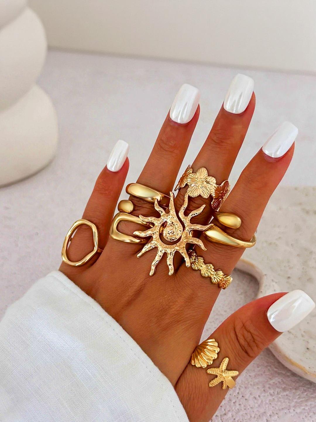 Buy Jewels Galaxy Set Of 8 Gold Plated Adjustable Finger Ring - - Accessories for Women