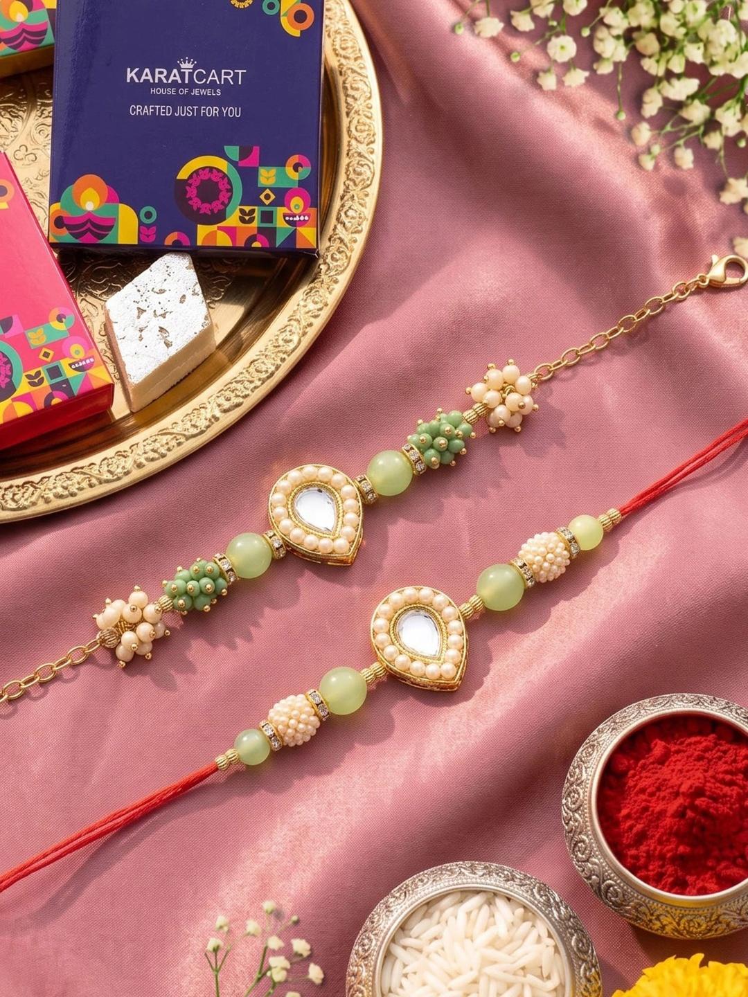 Buy KARATCART Set Of 2 Gold Plated Kundan Studded Bhaiya Bhabhi Rakhis With Roli Chawal - - Accessories for Unisex