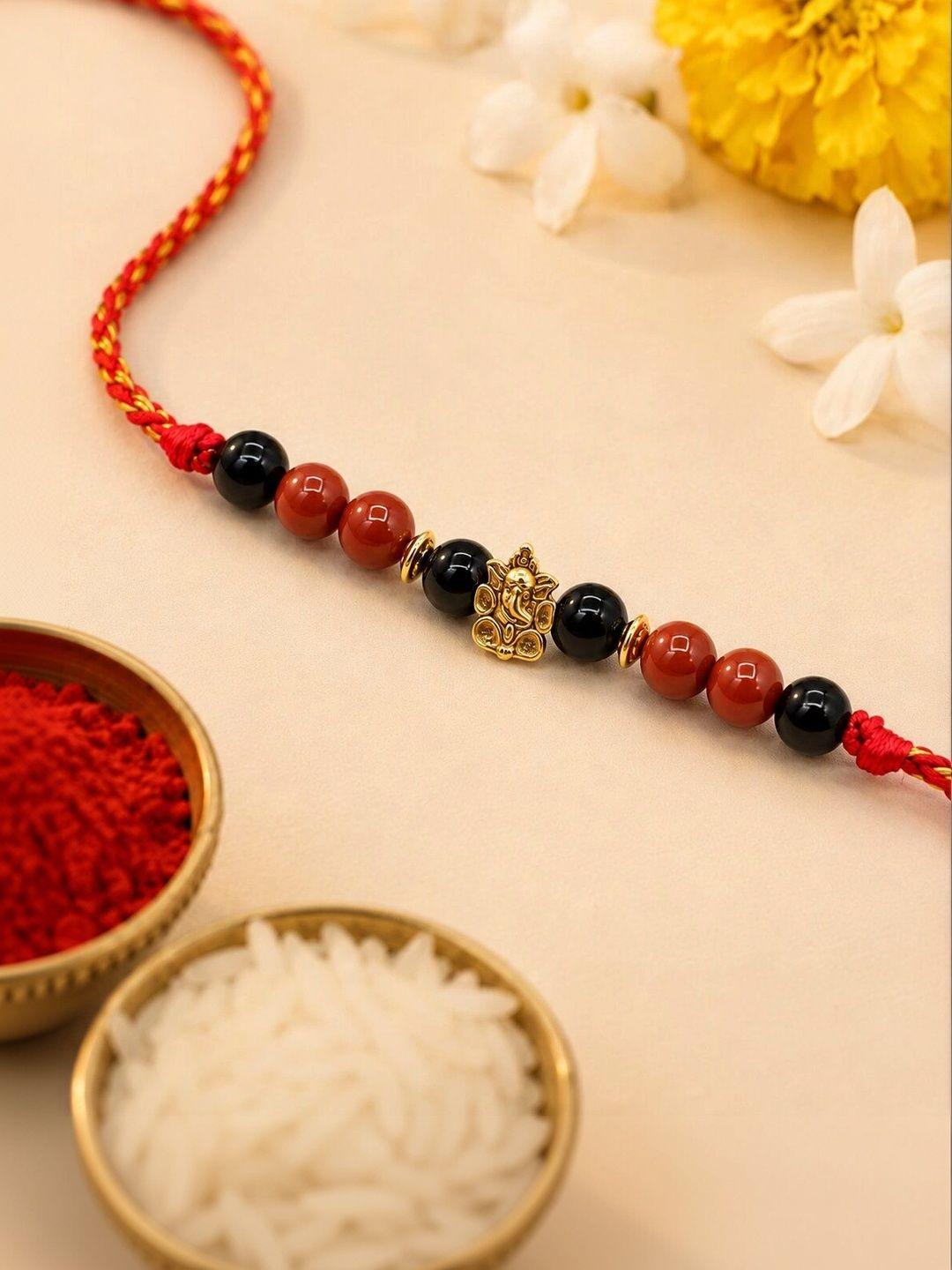 Buy Calminds Black Tourmaline & Red Jasper Crystal Rakhi With Ganesha Charm - - Accessories for Men