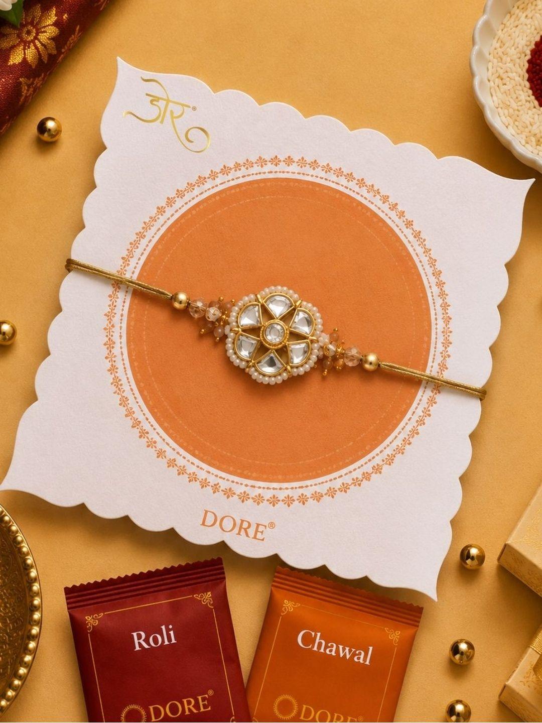Buy Dore Elegant Jaipuri Kundan Floral Rakhi With Pearl Accents & Roli Chawal Kit -  - Accessories for Unisex