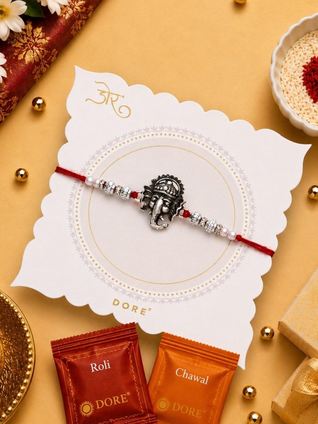 Buy Dore Oxidized Silver Antique Ganesha Rakhi With Roli Chawal - - Accessories for Unisex