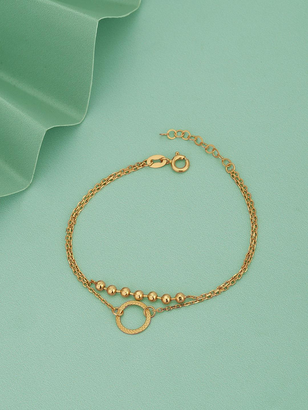Buy Carlton London Women Brass Gold Plated Charm Bracelet - - Accessories for Women