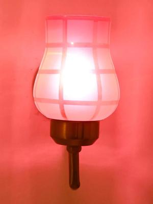 Myntra Elegant Homes Pink Textured Glass Contemporary Abstract Shaped Shaped Wall Lamp