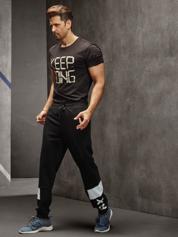 55% OFF on HRX by Hrithik Roshan Men Black Solid Slim Fit Training Joggers  on Myntra