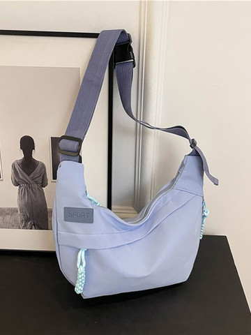 StyleCast x Revolte Half Moon Sling Bag
