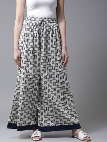 Moda Rapido Women Off-White & Navy Blue Printed Flared Palazzos