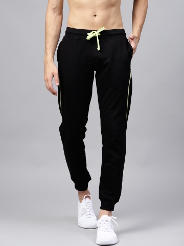 Buy HRX by Hrithik Roshan Men Black Solid Joggers on Myntra ...