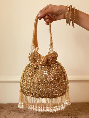 THE TAN CLAN Sehaj Embroidered Tasselled Suede Wrist Loop Potli Clutch