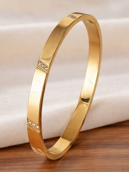 DressBerry Women American Diamond Temple Gold-Plated Bangle-Style Bracelet