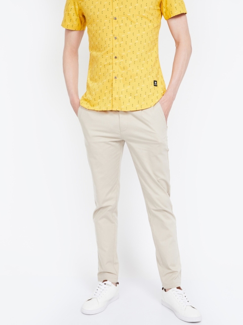 

Fame Forever by Lifestyle Men Beige Slim Fit Solid Regular Trousers