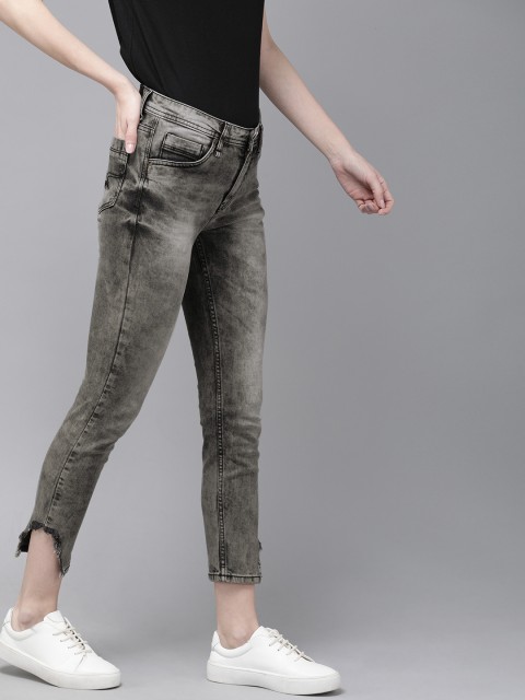 

Roadster Women Black Skinny Fit High-Rise Clean Look Stretchable Jeans With Distressed Hem
