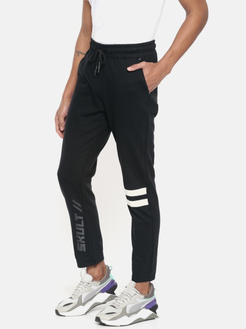 

Skult By Shahid Kapoor Men Black & White Solid Straight-Fit Trackpant