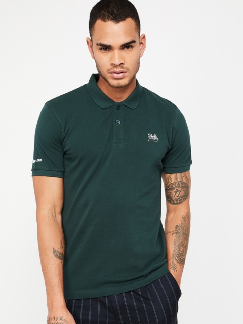 

UCLA Men Green Solid Polo Collar T-shirt