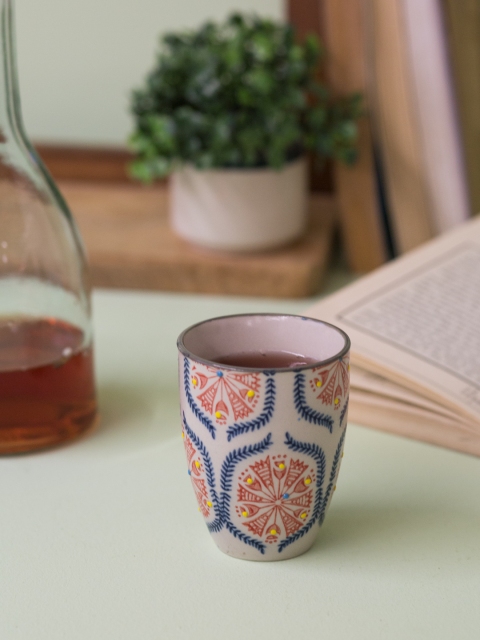

Chumbak Off White & Orange Printed Tea Cup