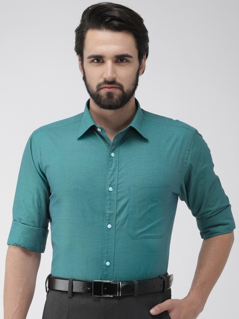 

Raymond Men Teal Blue Slim Fit Solid Formal Shirt