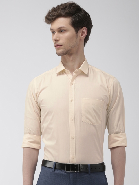 

Park Avenue Men Cream with a Tinge of Yellow Slim Fit Solid Formal Shirt