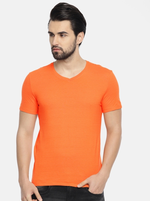 

Calvin Klein Jeans Men Orange Solid V-Neck T-shirt