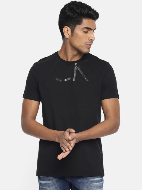 

Calvin Klein Jeans Men Solid Round Neck T-shirt, Black
