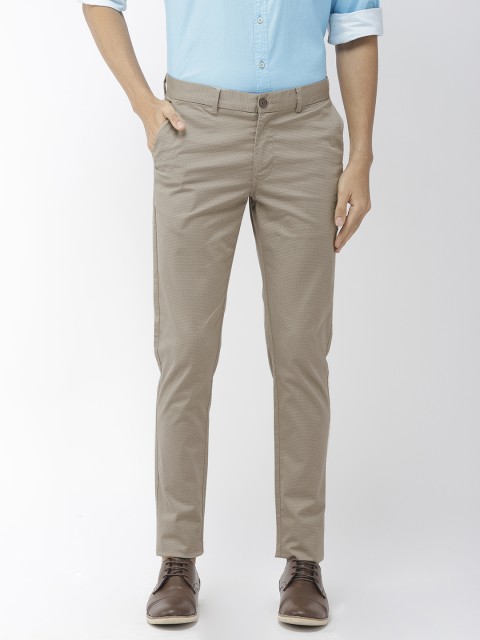 

Indian Terrain Men Beige Kruger Skinny Fit Self Design Regular Trousers