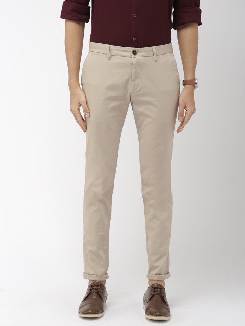 

Indian Terrain Men Beige Urban Comfort Fit Self-Design Smart Casual Trousers