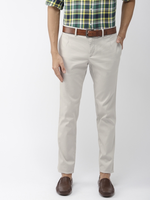 

Indian Terrain Men Beige Urban Comfort Fit Self Design Regular Trousers