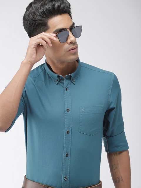 

Indian Terrain Men Teal Blue Chiseled Slim Fit Solid Smart Casual Shirt