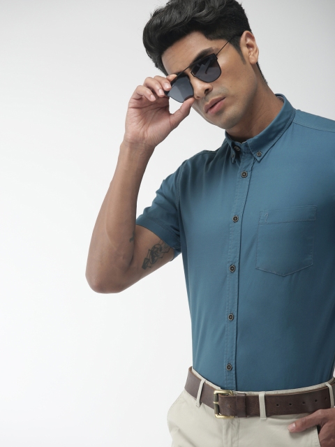 

Indian Terrain Men Teal Blue Slim Fit Solid Smart Casual Shirt