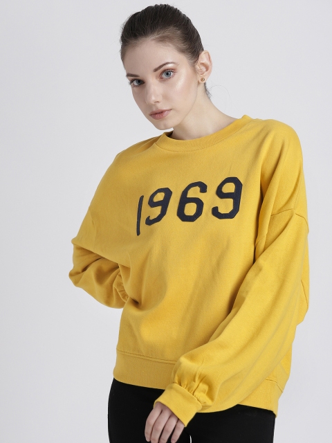 

GAP Women's Vintage Soft Gap Logo Sweatshirt, Mustard