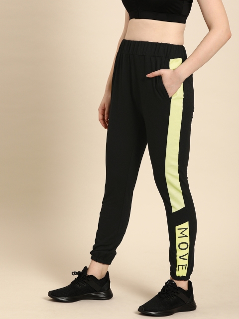 

DressBerry Women Black Solid Joggers With Side Stripes