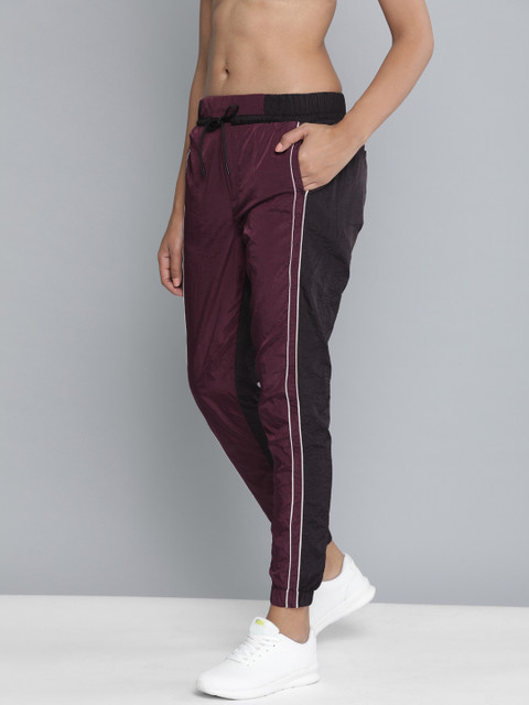 

HRX by Hrithik Roshan Burgundy & Black Solid TAPERED Lifestyle Track Pants