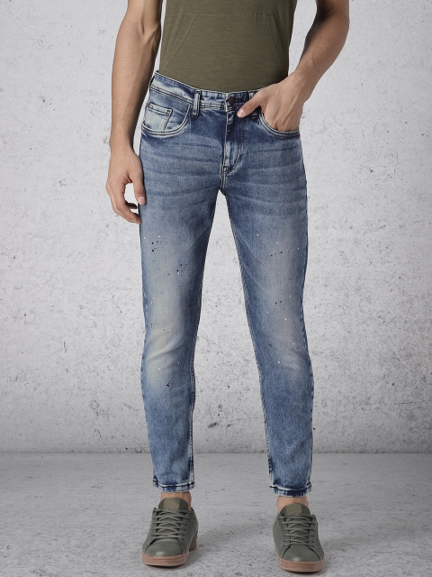 

Ecko Unltd Men Blue Slim Tapered Fit Mid-Rise Clean Look Stretchable Ankle Length Jeans