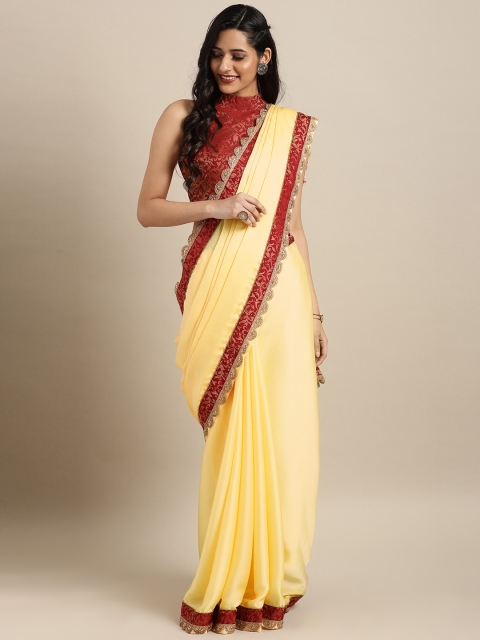 

Inddus Yellow & Maroon Satin Solid Saree