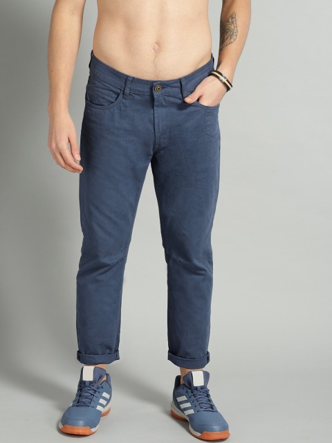 

The Roadster Lifestyle Co Men Navy Blue Slim Fit Solid Regular Trousers