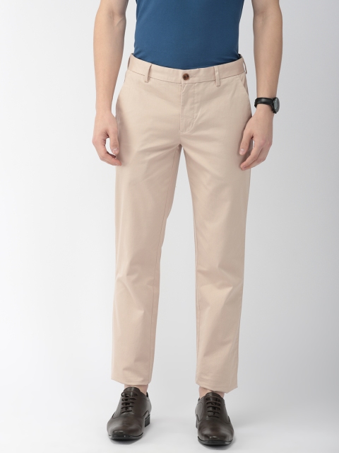 

Park Avenue Men Beige Tapered Fit Solid Trousers