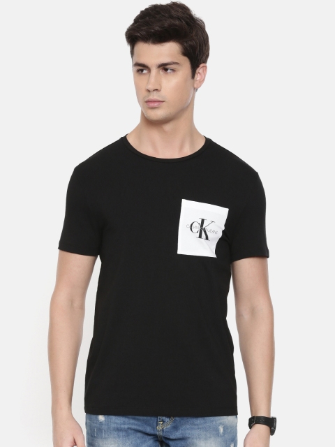

Calvin Klein Jeans Men Black Solid Round Neck T-shirt