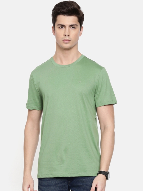 

Calvin Klein Jeans Men Green Solid Round Neck T-shirt
